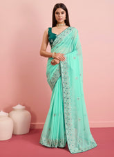 Alluring looking sea green colour saree
